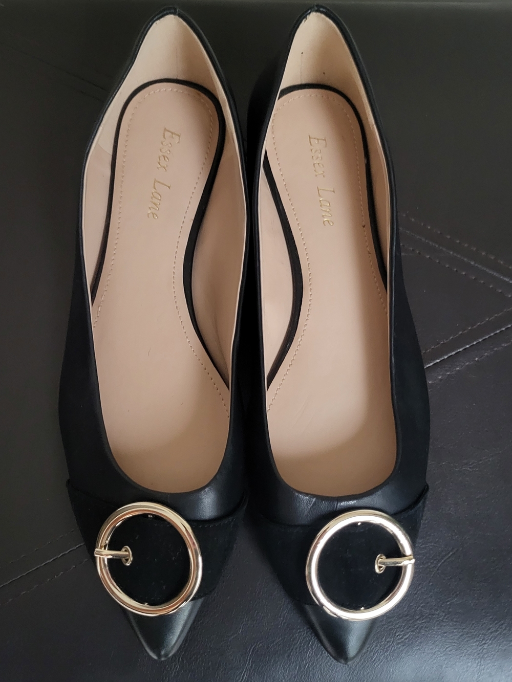Essex Lane Black Pointed-Toe Flats with Large Gold Circle Accent